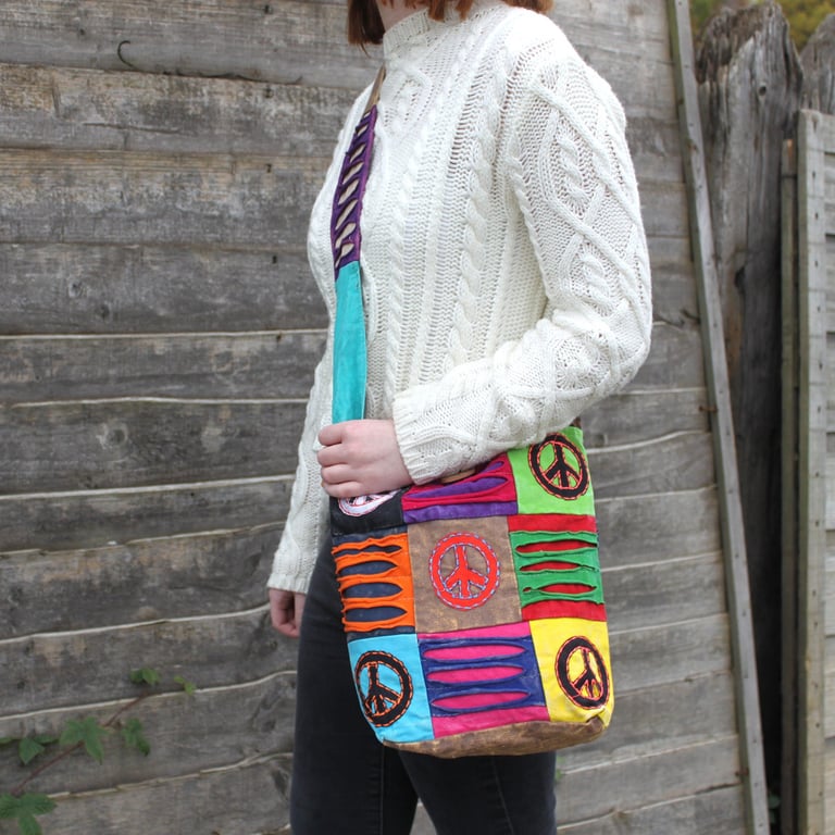 Handwoven Bohemian Teal Sling Bag with Om Symbol - Artisanal Ethnic Design