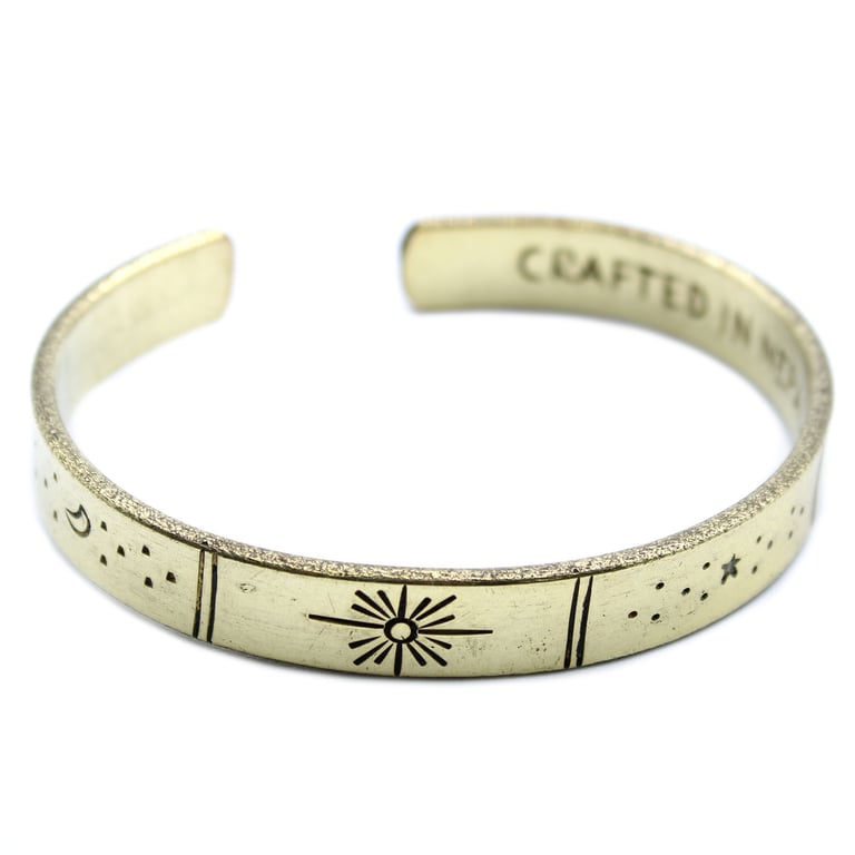 Galaxy Inspiration Bracelet - Brass Star and Earth Motif Home Decor Accessory