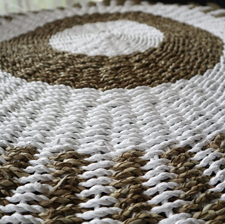 Seagrass Round Mat (White & Tan) - 1m - Sun Or, if you want to include the brand name: Seagrass Round Mat (White & Tan) by Sun - 1m