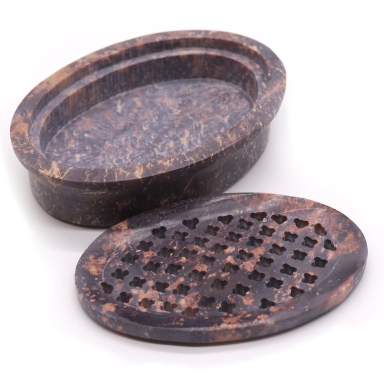 Classic oval soapstone bathroom soap holder and drainer measuring 11x8cm on a white background
