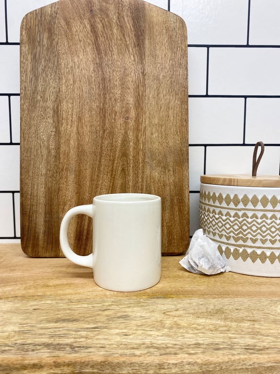 Temerity Jones Cream Ceramic Embossed Bee Mug - Elegant Home Decor with Unique Bee Detail