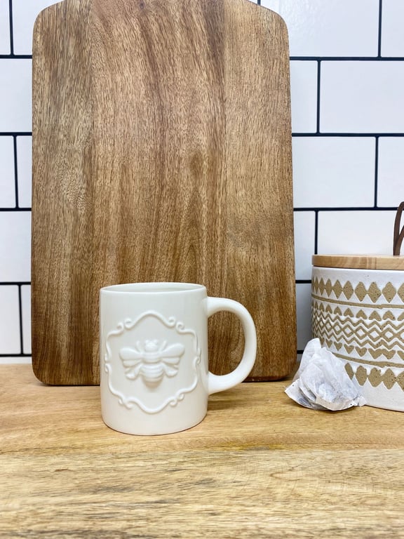 Temerity Jones Cream Ceramic Embossed Bee Mug - Elegant Home Decor with Unique Bee Detail