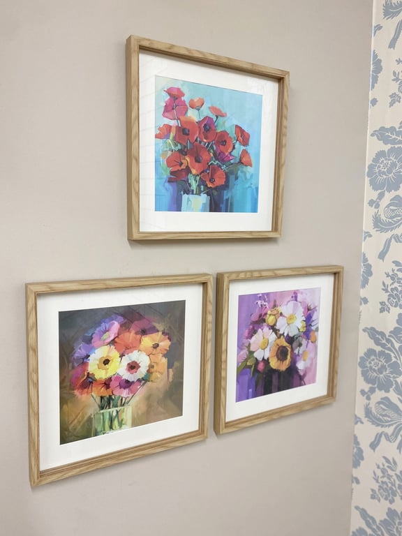 Set of Three Wooden Sunburst Frames with Colourful Floral Prints