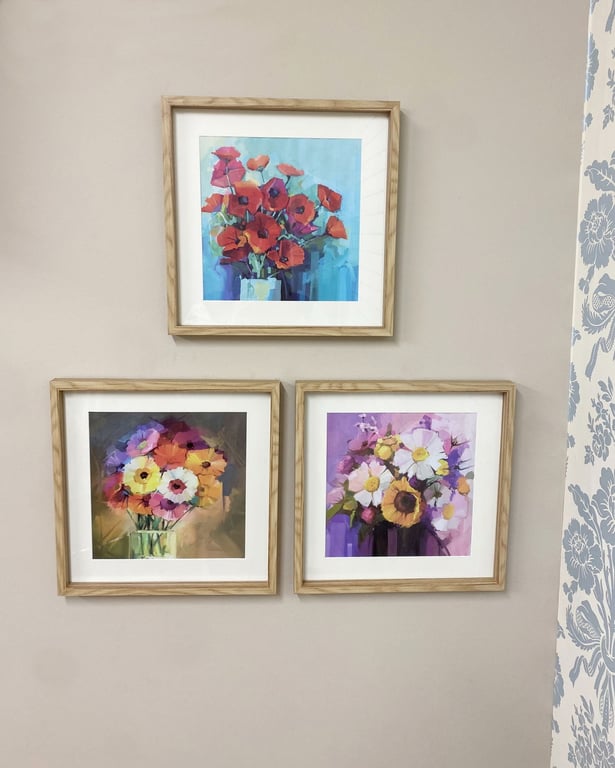 Set of Three Wooden Sunburst Frames with Colourful Floral Prints