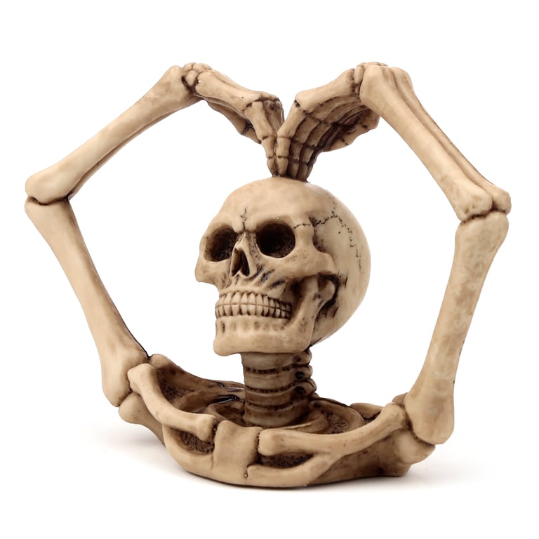 Gothic Resin Skull Decoration with Skeleton Arms and Heart Design
