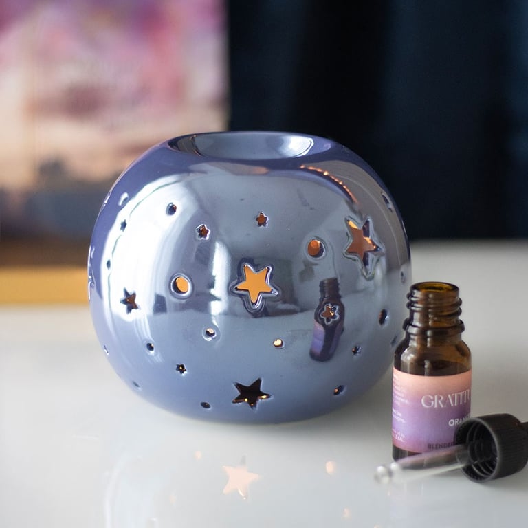Purple Iridescent Star-Shaped Oil Burner and Wax Warmer for a Whimsical Home Ambiance