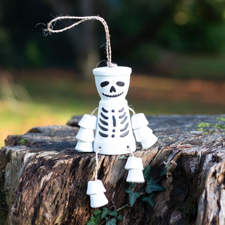 White Skeleton Terracotta Pot Man - Unique Outdoor Decoration for Nontraditional Gardens