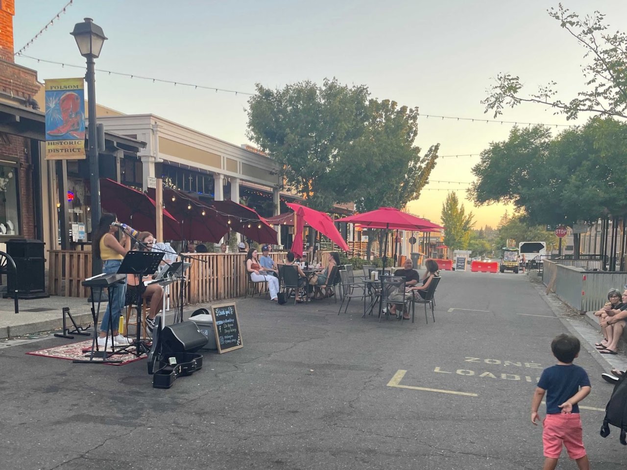 Sutter Street in Folsom, closed off to vehicle traffic, on a Friday evening at sunset - © 2021 Sierra Swag