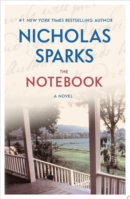 The original cover for 'The Notebook' by Nicholas Sparks features a serene, nostalgic image of a porch overlooking open fields, which evokes a sense of peace and reflection. The background features cursive text that adds a layer of sentimentality.