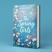 standing book mockup, Its title is "The Spring Girls". Its author name is Anna Todd.  A vibrant blue background with a soft, ethereal glow. Wildflowers of various colors cascade down from the top left corner, creating a dynamic and organic feel. The title, "The Spring Girls," is placed in the bottom right corner, with each word stacked on top of each other in a delicate and flowing font. The author's name, Anna Todd, is displayed in a simple and elegant font at the top center of the cover. The title is written in a script font that evokes a sense of growth and nature, while the author's name is in a clean and modern font that adds balance to the overall design., The visual elements are asymmetrically arranged, with the wildflowers flowing down one side of the cover, creating movement and depth. The title and author's name are strategically placed for optimal readability and visual impact.