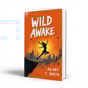 standing book mockup, Its title is "Wild Awake". Its author name is Hilary T. Smith.  The cover features a vibrant orange background with a silhouette of a girl captured mid-jump against a bright city skyline. Paint splatters arc across the scene, adding a sense of energy and chaos to the design. The title "Wild Awake" is bold and dynamic, with a handwritten style font that complements the adventurous theme of the book. The author's name, Hilary T. Smith, is displayed in a clean and elegant font, ensuring readability., The title is positioned at the top of the cover, with the author's name placed at the bottom. The silhouette and cityscape occupy the central area, creating a focal point for the viewer's attention.