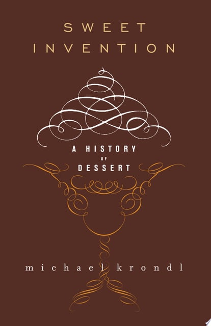 The original cover uses a delicate, swirling design reminiscent of elegant desserts or antique calligraphy, set against a rich chocolate brown background.