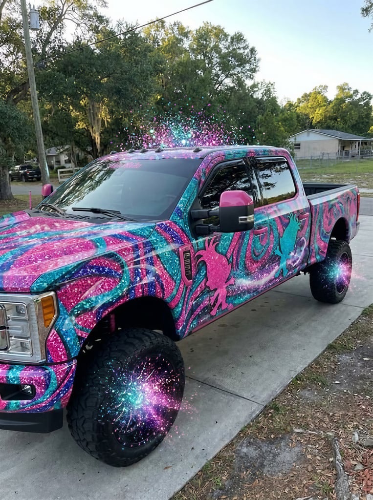 bright glittery truck wrap with trolls and swirls