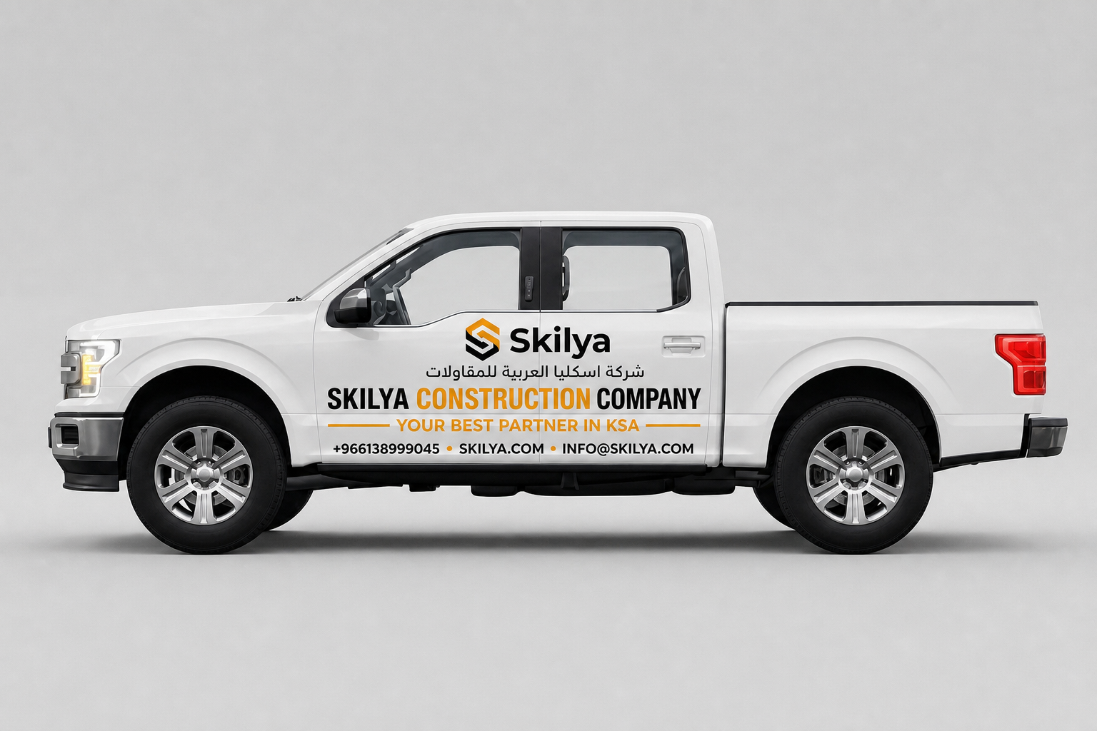 Professional construction trailer wrap in black and amber yellow