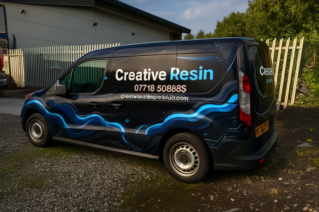 black van with blue and grey creative resin wave design