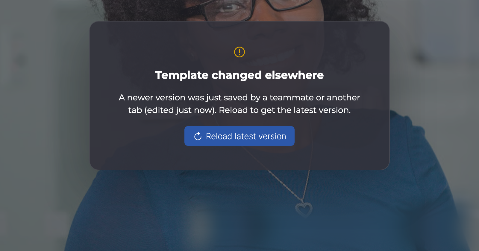 Template changed elsewhere notice over the editor with the Reload latest version button.
