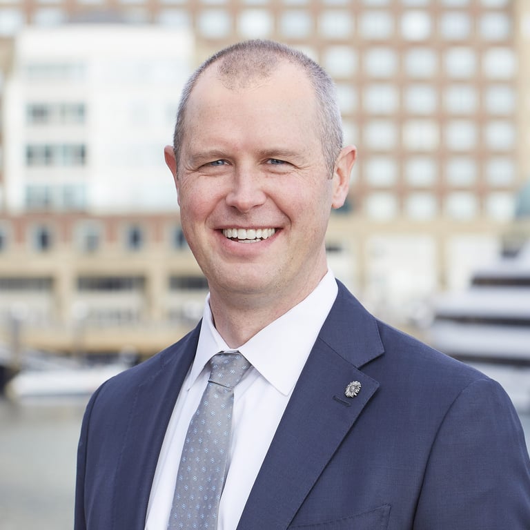 J. Tucker Merrigan - industry