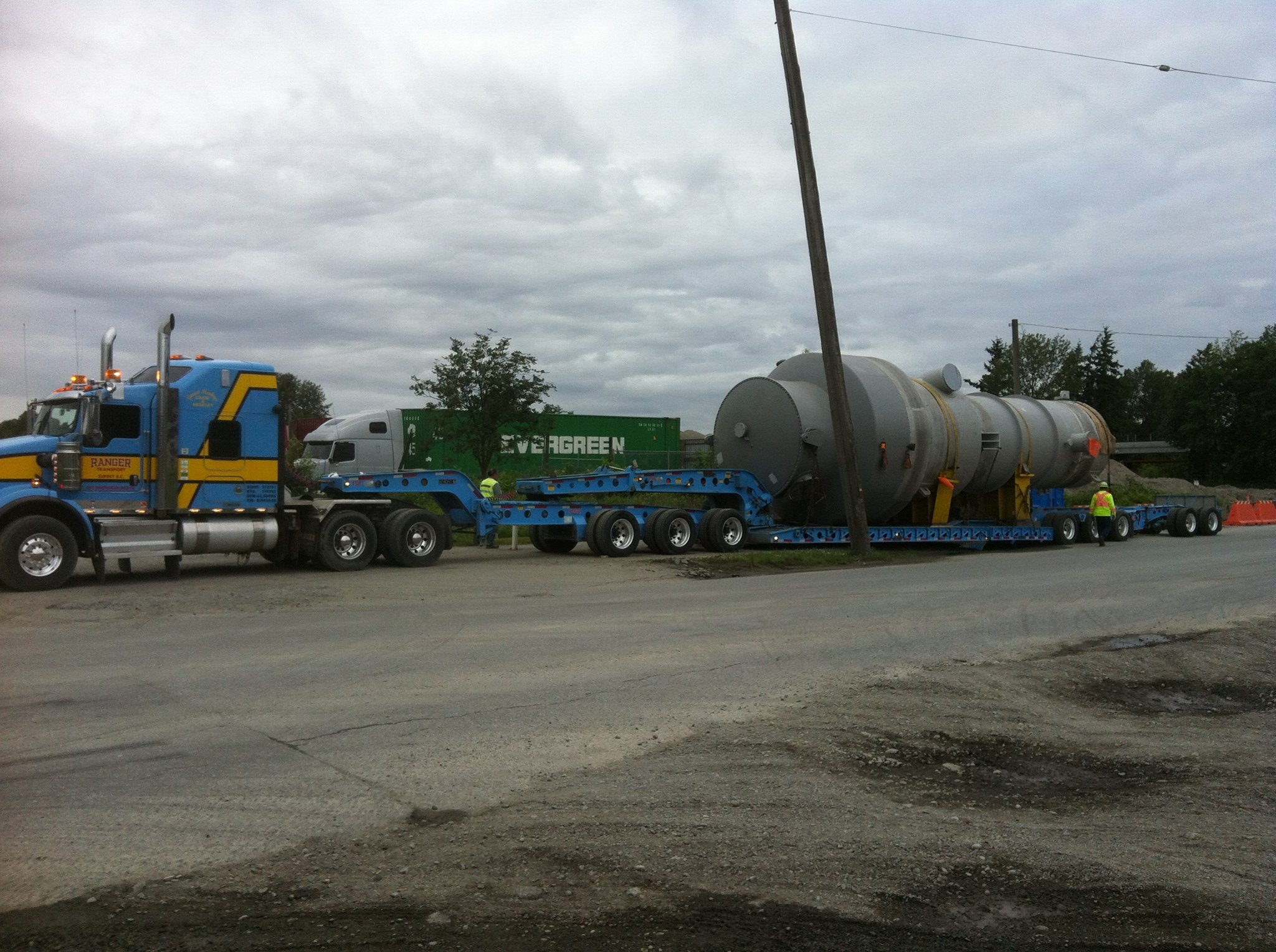 machine-transport-industrial-tank-lowboy Industrial tank secured on lowboy trailer for machinery transport