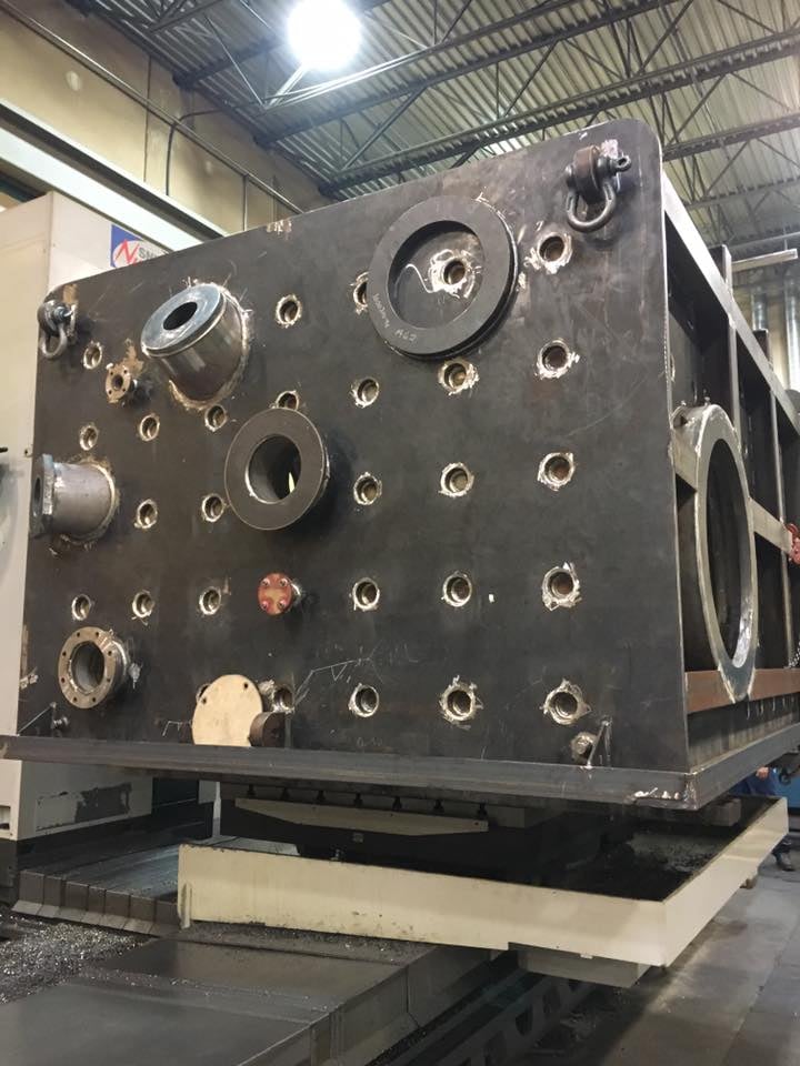 machine-transport-heavy-machined-block Heavy machined steel block staged for machine transport