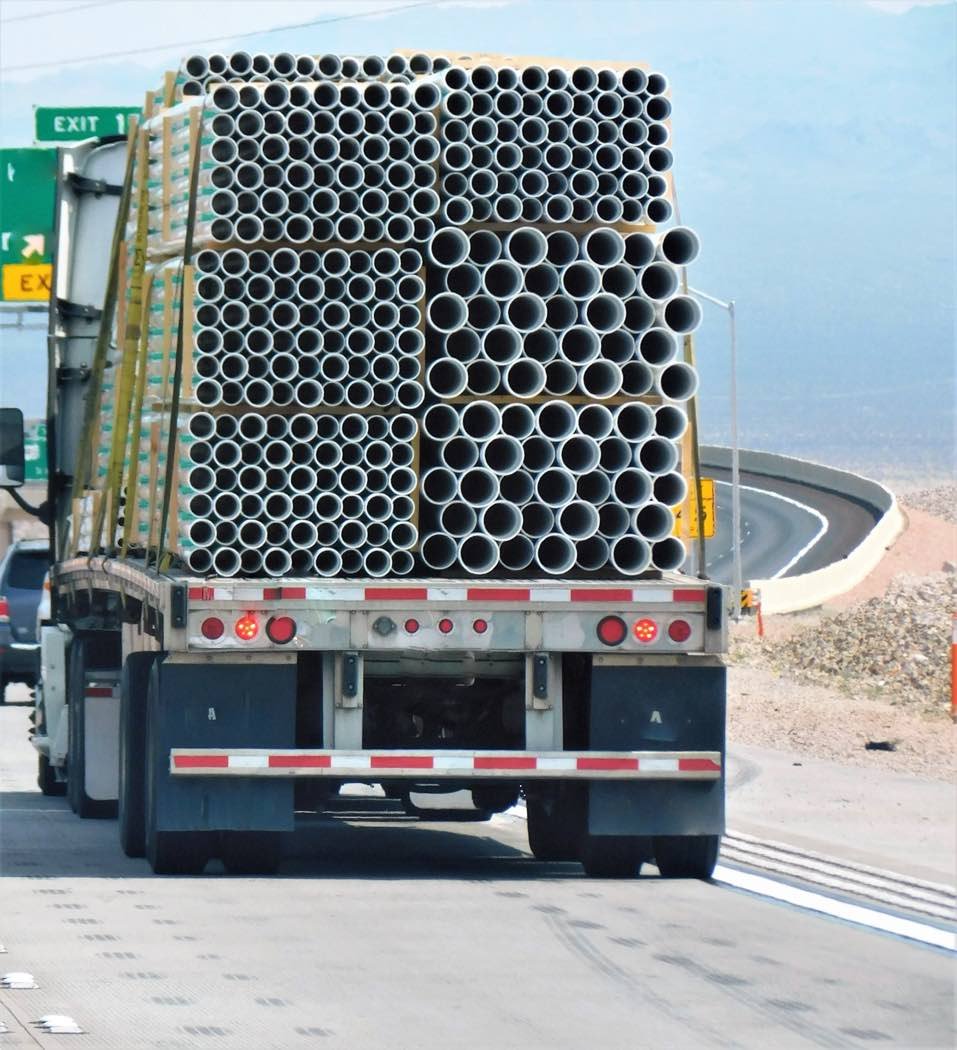 Flatbed trucking services - flat bed truck with steel coils