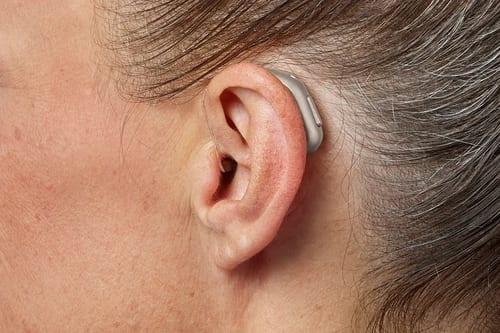  oticon intent minirite h1 2024 c090chromabeige angleb45 close up in on ear ms 6183 woman 1200x800px original file private health cover for hearing aids what you need to know   the audiology place