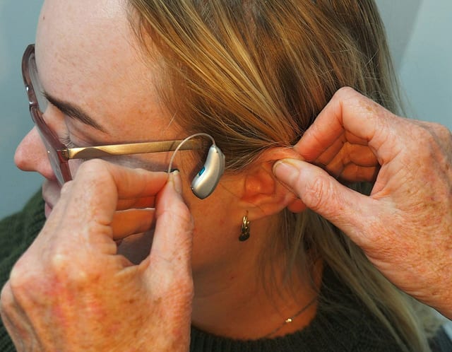 mark paton lvmjreyivja unsplash scaled best hearing aids for speech clarity what actually helps the audiology place