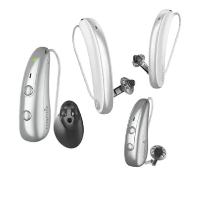 collection of silver behind the ear and in the ear hearing aids with silicone ear tips arranged on a white background signia ix lineup learn the audiology place page 2