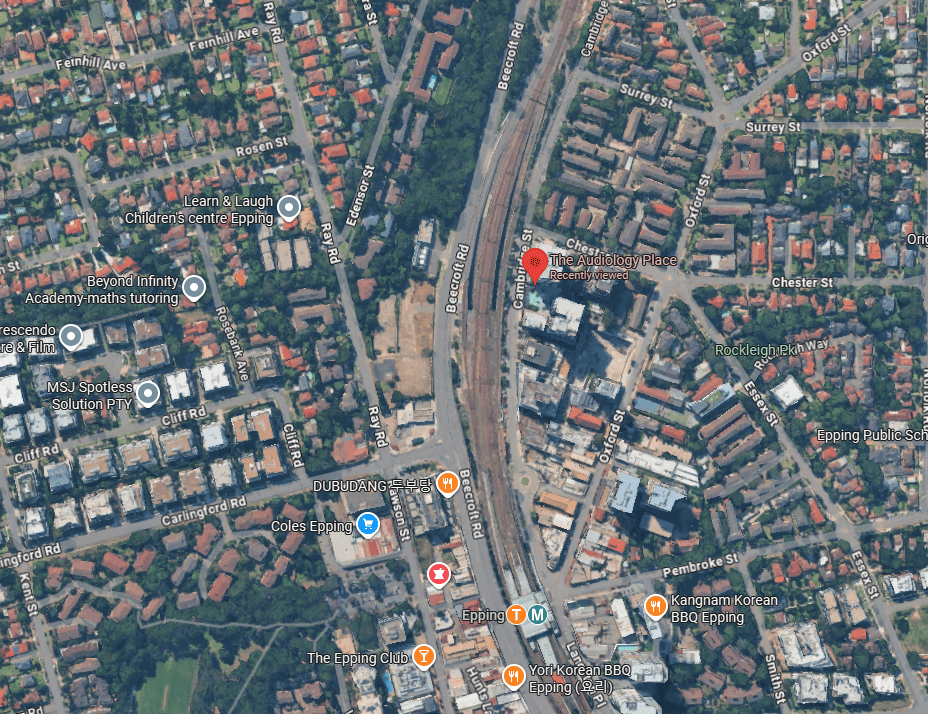 satellite view of a suburban area around epping with a marker on the audiology place near a railway line and several businesses nearby epping audiology learn the audiology place page 8