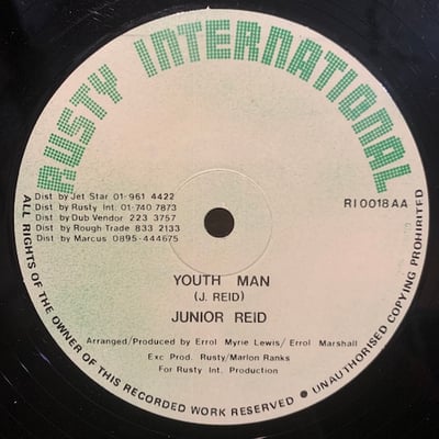 Junior Reid - Bank Clerk / Youth Man picture 2