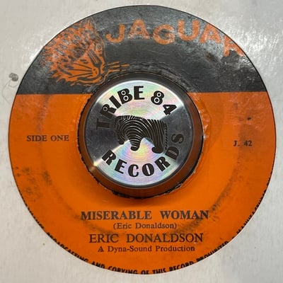 Eric Donaldson - Miserable Woman / The Lion Sleeps picture 2