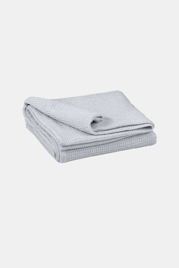 Luxusná prikrývka na posteľ Siesta sivá