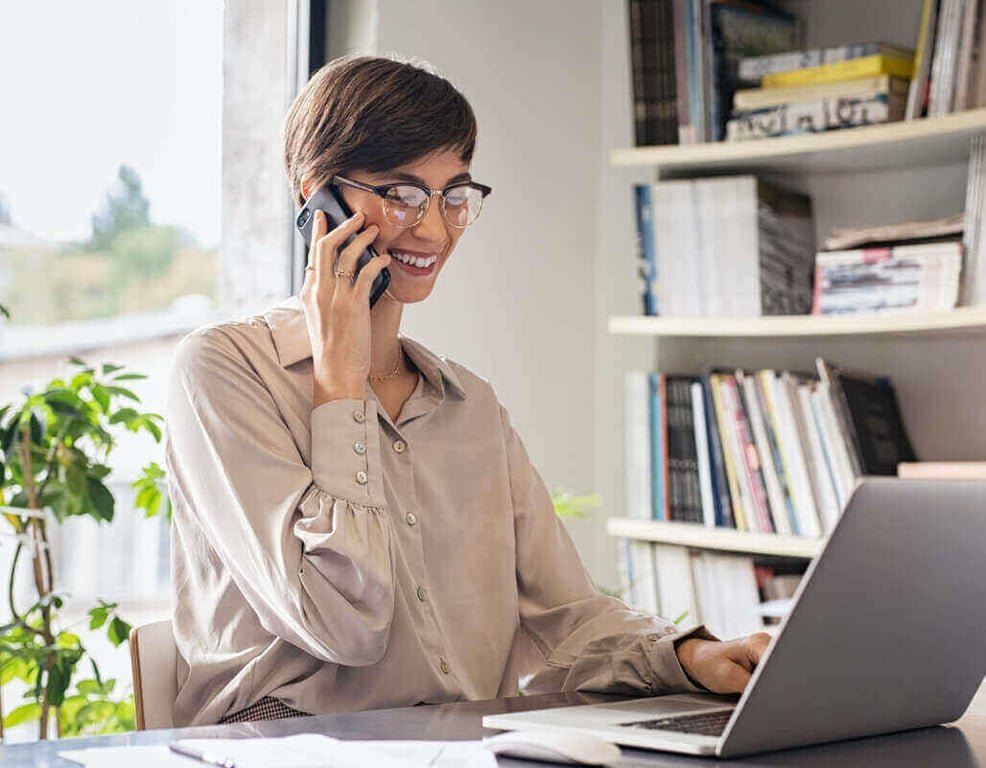 smiling-on-phone-wide-2x-493e4bfa45eaafcebd3c8f76256bca0abfdd3e7d12b7f9dd60c1debf40df30d8-5.jpg