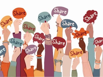 Diverse hands holding "Share" signs in different colors, promoting community sharing and engagement.
