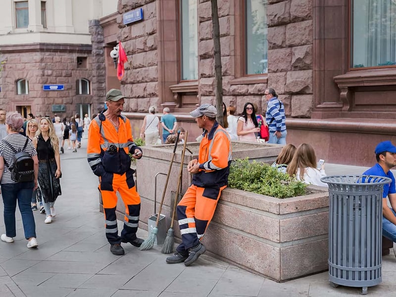 Scenic view of a pristine Irish town square, beautifully maintained with flowers and clean streets, representing Tidy Towns Ireland