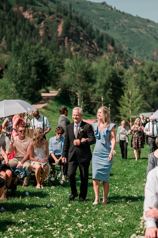 Aspen Mountain Village wedding ceremony with red mountain backdrop