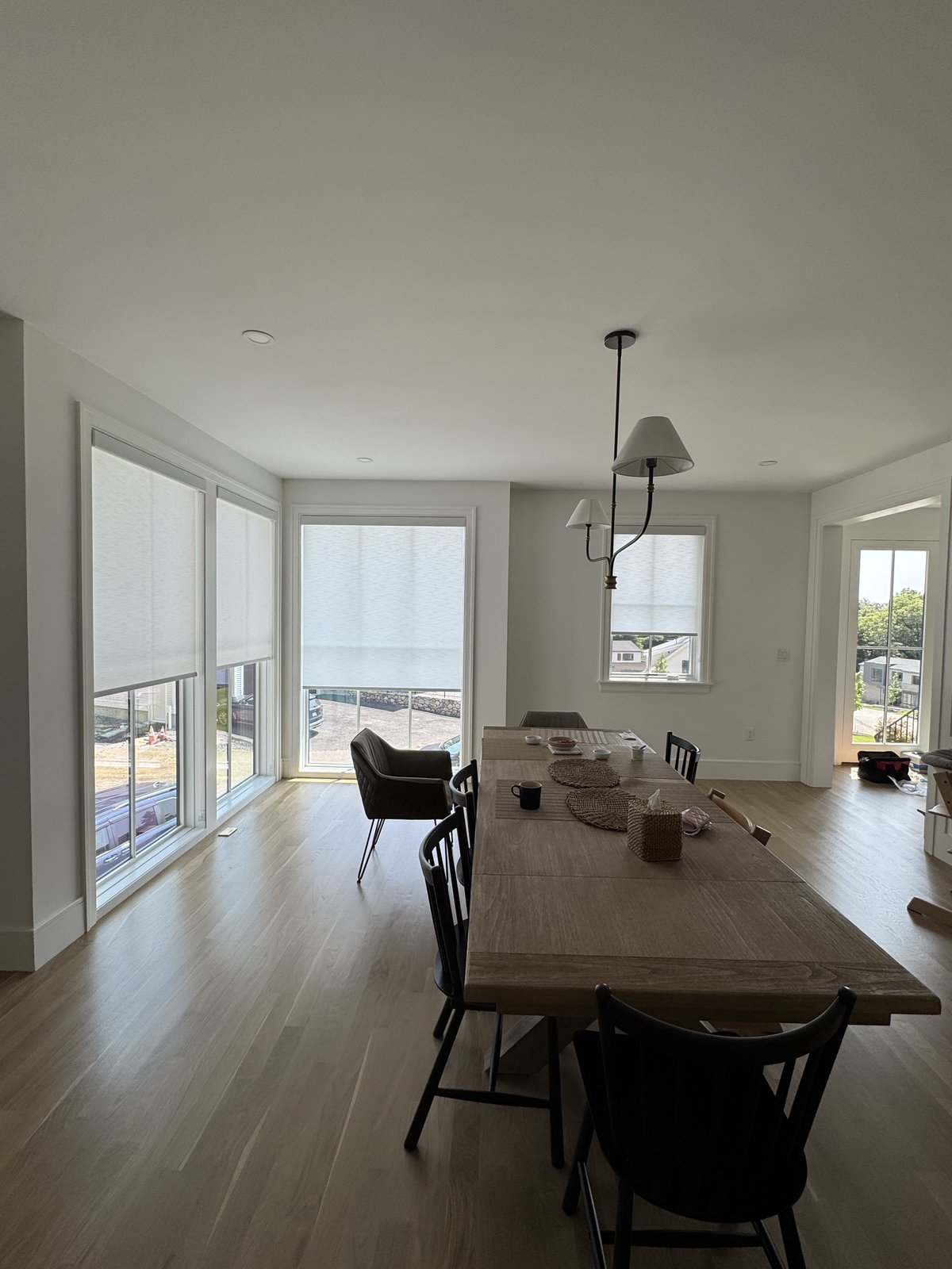 Light-filtering roller shades in a KALIA dining room installation