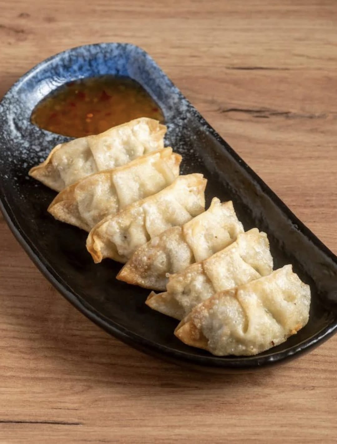 Gyozas de pollo a la plancha y salsa de soja