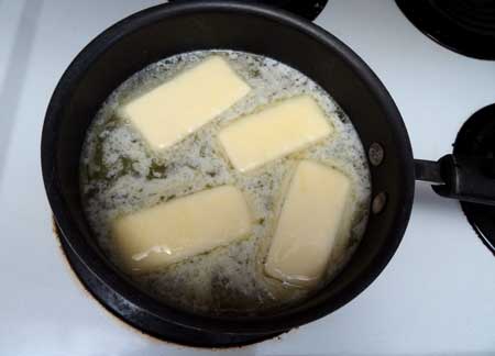How to make weed butter - Cannbutter Recipe Add butter to the water on the stovetop for this cannabutter recipe