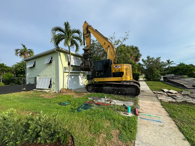 Two-story home in Boca Raton before full residential demolition, 2025