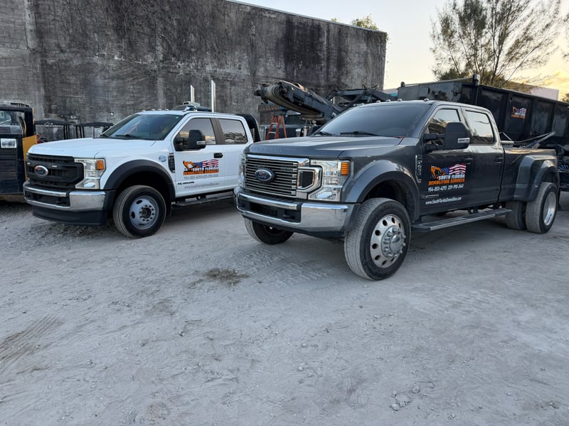 South Florida Demolition Services company work trucks