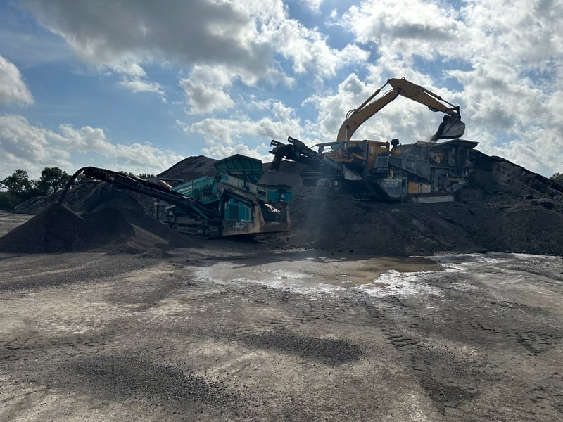 Crushing and screening equipment operating at a South Florida demolition project