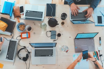 Computers on a table.