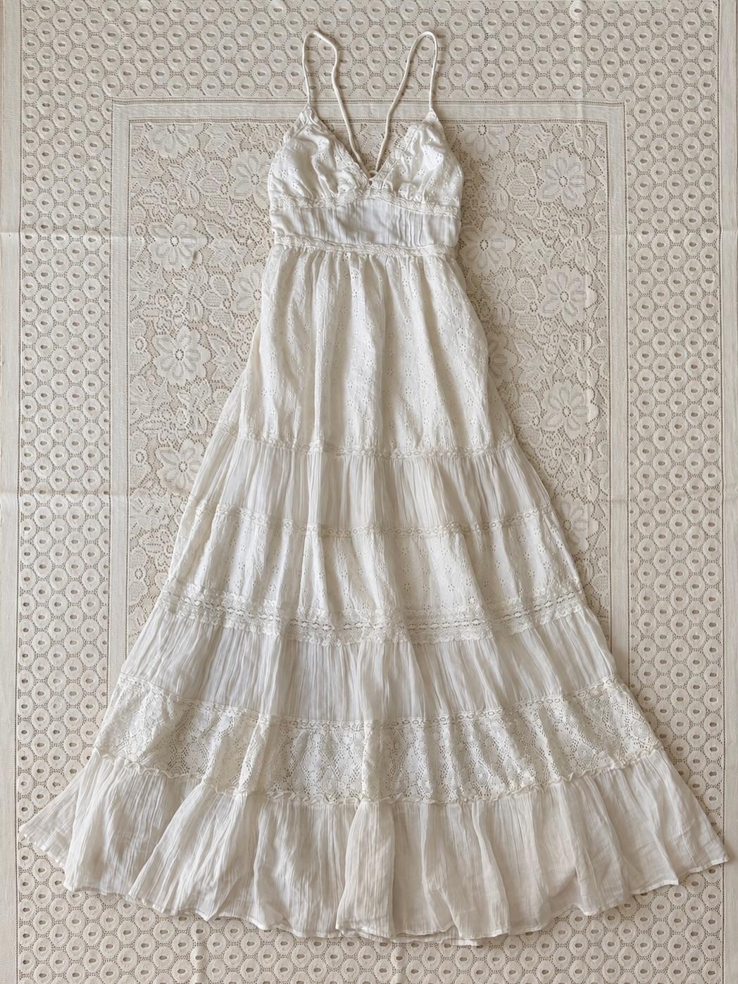Product: White tie up back maxi dress by Kimchi Blue