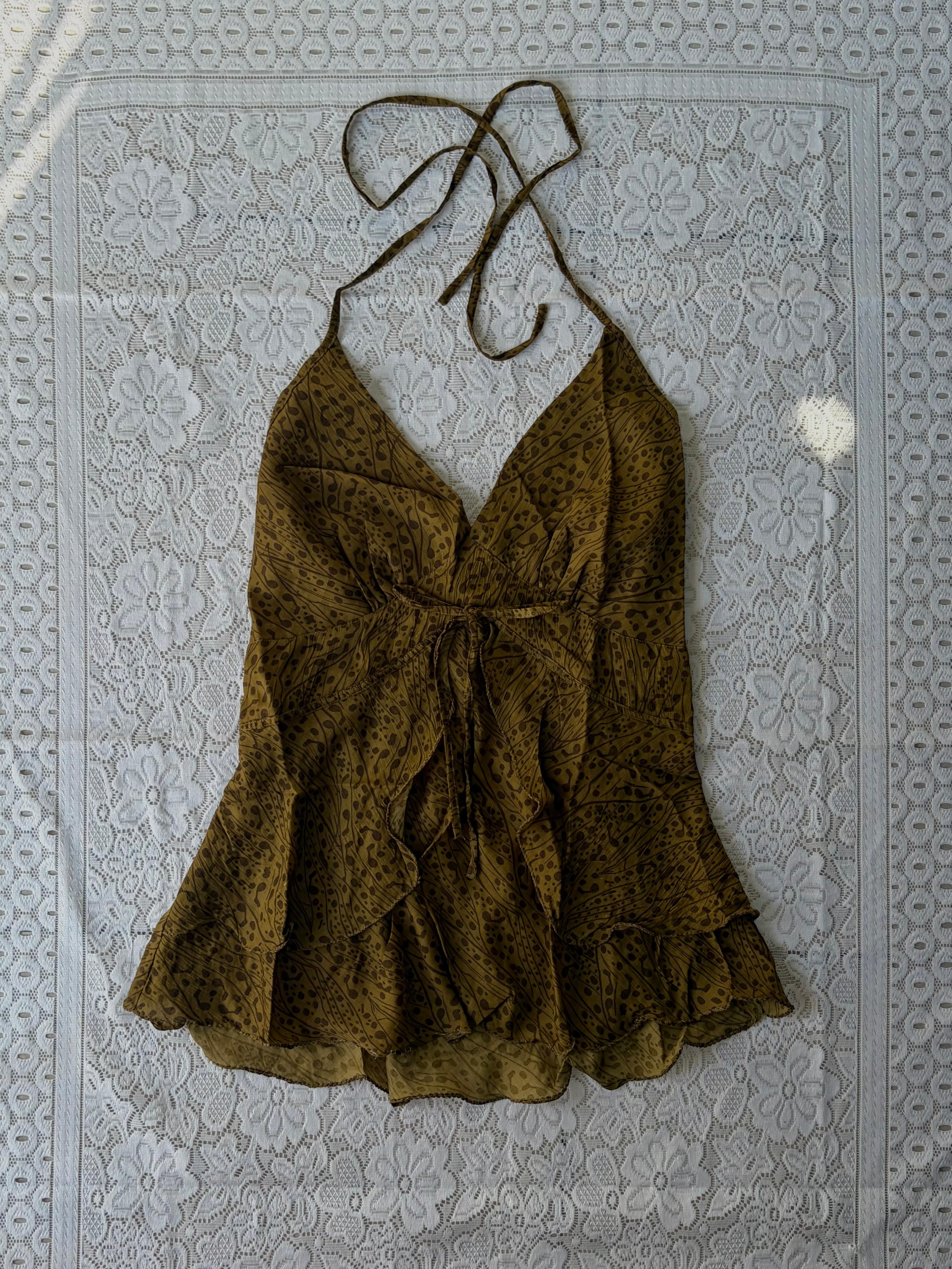 Product: Olive green halter neck top with ruffle front