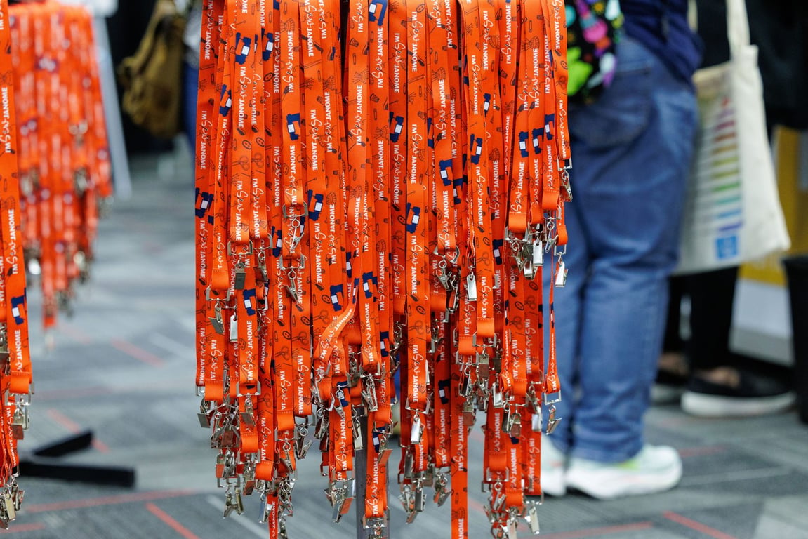 Attendee badges and lanyards at h+h americas