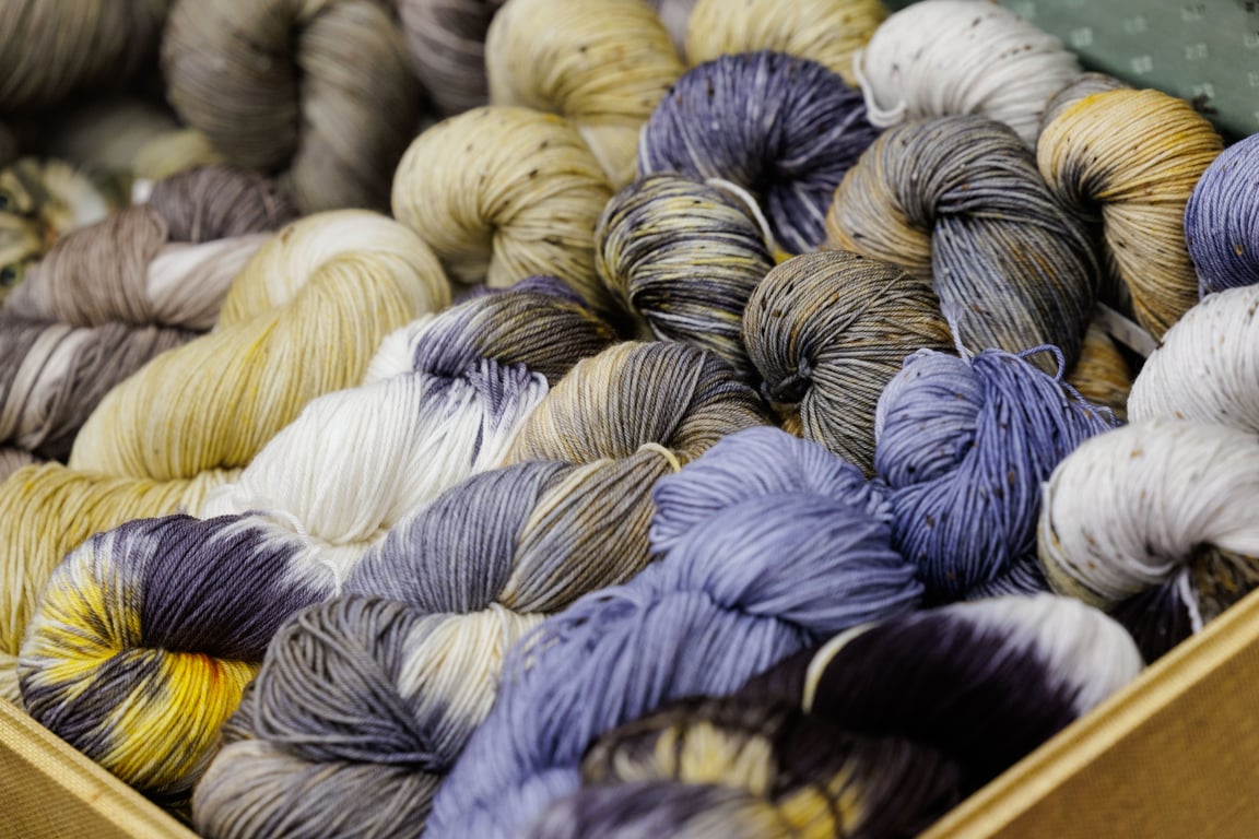 Hand-dyed yarn skeins at Sample It — h+h americas Fall Edition