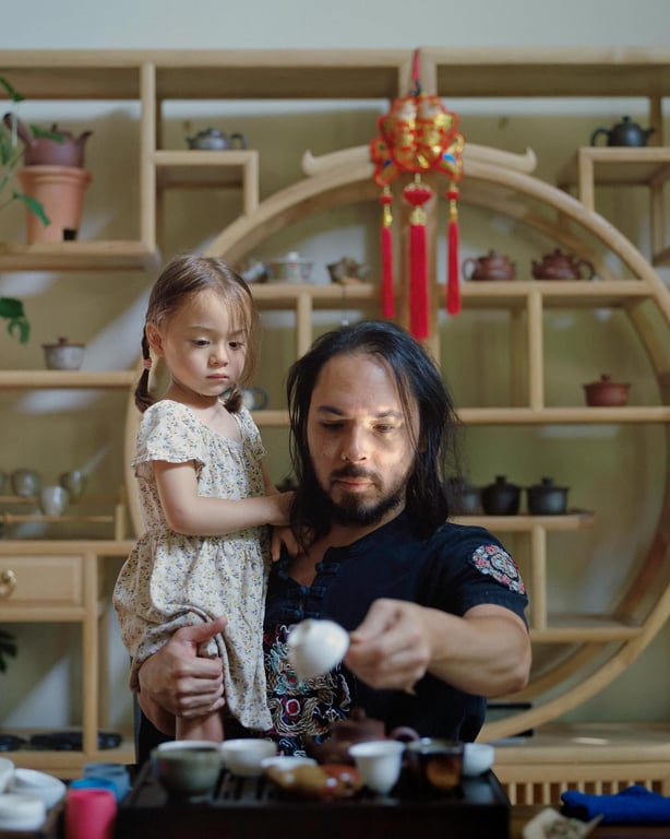 Father and daughter in tea ceremony
