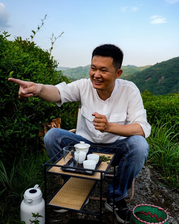So-Han Fan preparing tea outdoors in mountainous setting