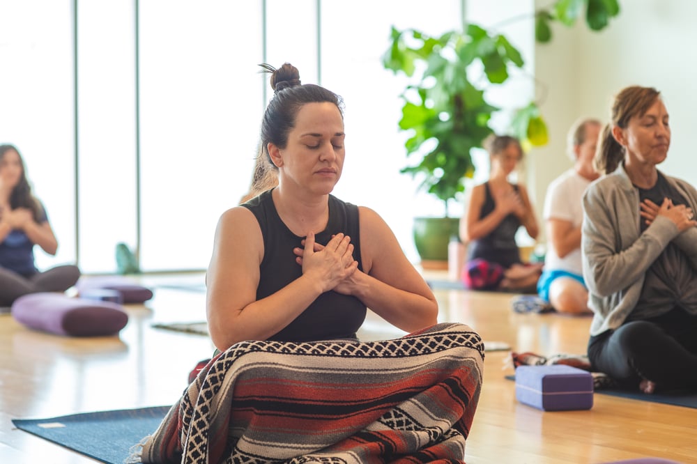 Sunday Fire with Derek lively at Flow Yoga Westgate in Westgate Austin