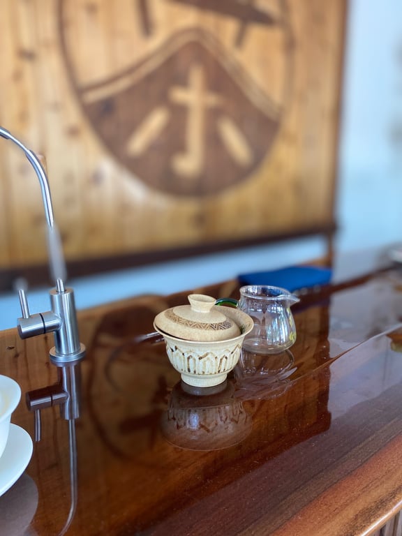 Studio interior with tea bar and carved logo